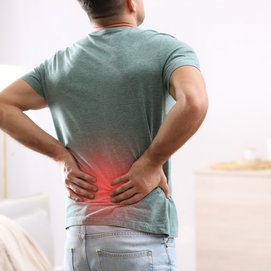 How can a mattress help reduce back pain?